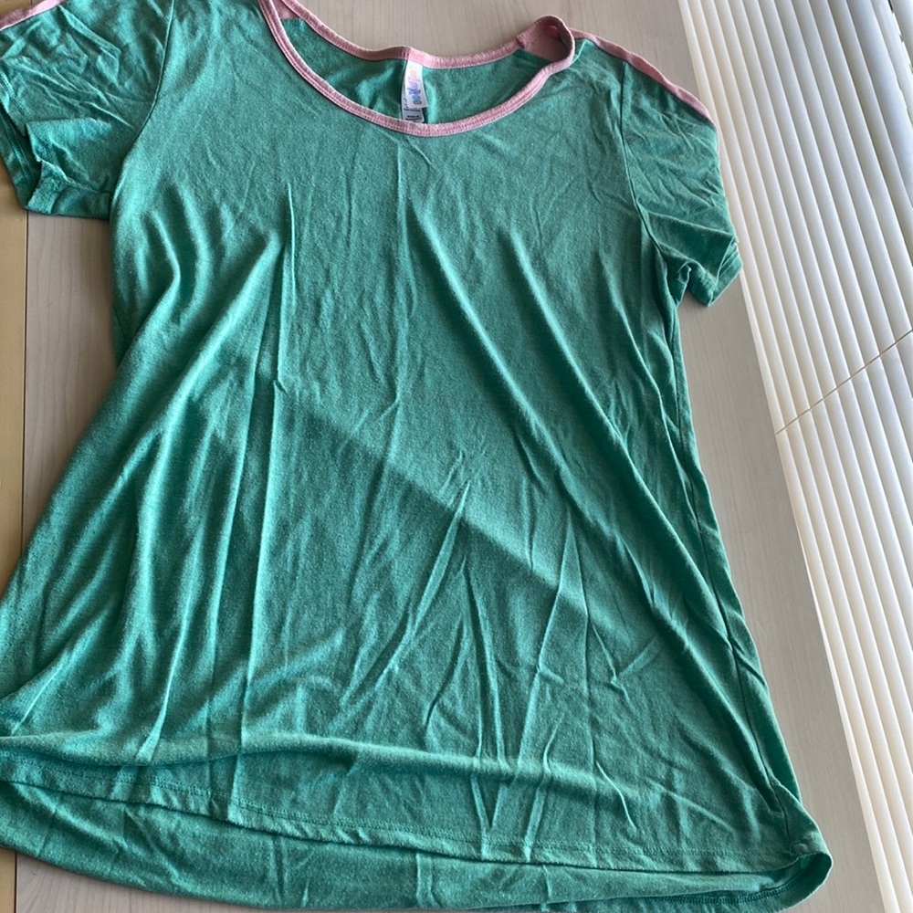 shirt with pink trim on shoulders